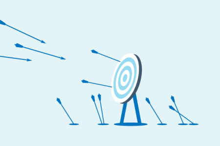 a target with arrows flying towards it