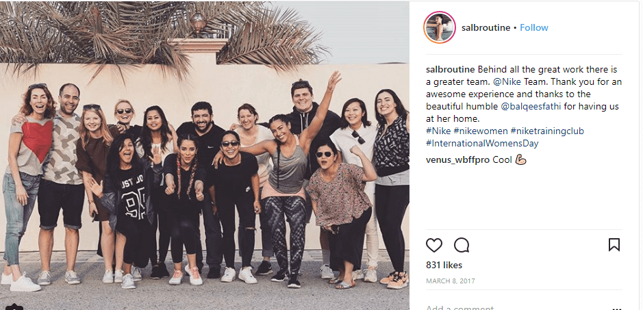 Instagram photo of an influencer posing with Nike employees